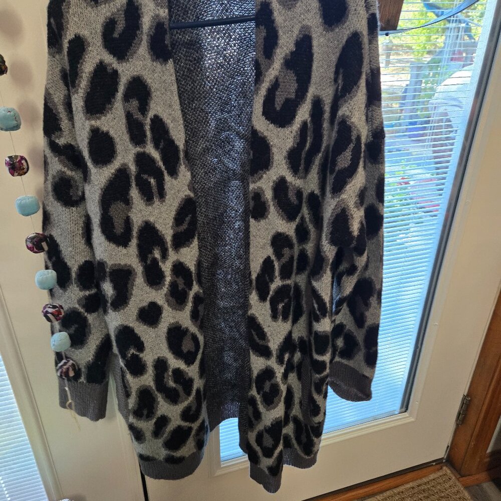 black and grey sweater with pockets